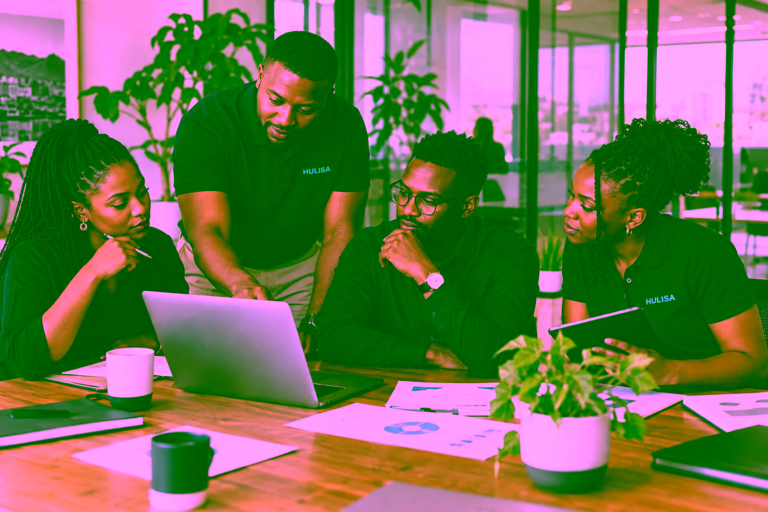 Illustrative Hulisa team discussing a project